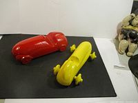 Red and yellow metal toy cars top view