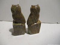 Front and rear view of both stone owl bookends