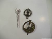 All three brooches overview