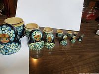 Full set of seven nesting dolls opened and lined up