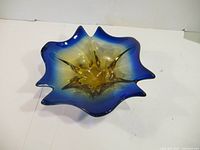 Top view showing color gradient and star-shaped rim