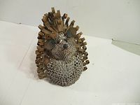 Front angled view of metal hedgehog lantern