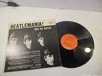 Front sleeve and vinyl record displayed