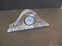 Front view showing crystal body, dial and bezel