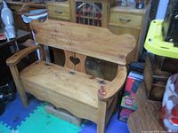 Front view of pine bench showing overall design and surrounding items