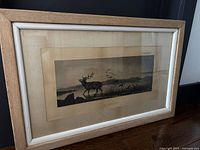 Framed print showing the entire artwork titled 'The Sanctuary' by Sir Edwin Landseer.