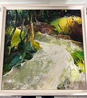 Front view of framed oil on board painting depicting a forest landscape with a river, signed by Julie King.