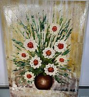 Frontal view of oil on canvas painting showing a floral arrangement with white flowers and red centers in a brown vase on a textured background.