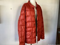 Full view of jacket on mannequin showing overall style and color