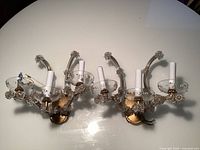 Pair of sconces showing overall design and quantity