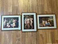 Photo showing all three framed prints laid out on floor, highlighting size and frame style