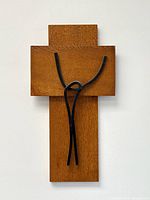 Front view of teak and wrought iron cross