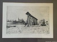 Full view of the etching print showing the countryside scene, including the hayrack and church in the distance, with pencil signature and numbering visible on the lower margin.