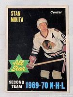 Front of 1969-70 Stan Mikita hockey card showing player in uniform and All Star designation.