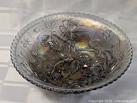 Top view of the 12-inch pressed glass bowl showing the floral and leaf embossed pattern and iridescent gasoline color finish.