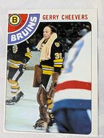 Front of Gerry Cheevers hockey card showing player photo and team logo.