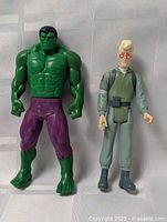 Both action figures captured together with front view showing size and condition.