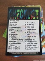 Back side of a checklist card listing character cards, guide entries, and covers from the 1994 Cardz Hitchhiker's Guide to the Galaxy trading card set.