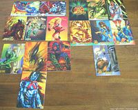 Top view of 17 Spider-Man and X-Men trading cards arranged on wooden surface showing various Marvel characters in full color.