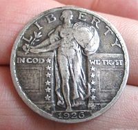Obverse of 1926 Standing Liberty quarter coin showing Lady Liberty, date, and inscriptions.