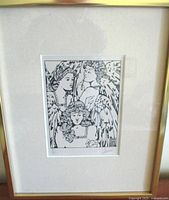 Photo of framed limited edition pen and ink drawing titled "Three Eves", showing the detailed depiction of three female figures with wings, signed by G. Gauci.