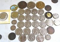 Full lot of Canadian coins including the housed 1967 silver dollar and various other coins.
