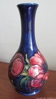 Front view of entire vase showing shape and floral pattern