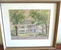 Full frontal photo of the framed watercolor painting showing the old country inn, greenery, children, and cat.