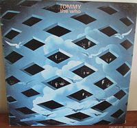 Front cover of the The Who Tommy double LP featuring stylized geometric blue design with birds.