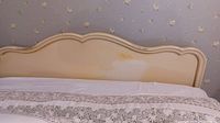 Headboard front view showing discoloration and stain spots