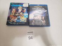 Front view of both Blu-ray cases showing titles and artwork