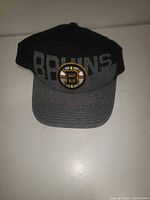 Front view showing Bruins crest and two-tone design