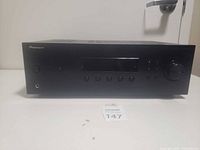 Front view of Pioneer receiver showing controls and display