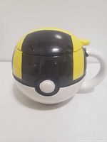 Ultra Ball ceramic mug with lid view