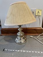 Lamp full view with shade, power cord visible