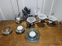 All candle holders on tabletop showing full lot