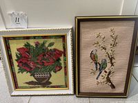 Both framed needlepoint pictures side by side to show complete lot