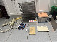 Group shot of all office supplies on floor