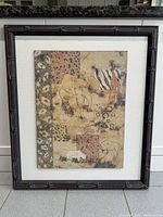 Full view of framed picture showing frame, mat and artwork