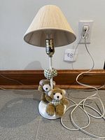 Full view of lamp, base, bears, shade and cord
