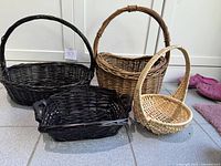 All four wicker baskets grouped for overview