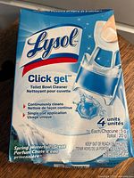 Front view of Lysol Click Gel Toilet Bowl Cleaner package showing brand, scent, and usage information.