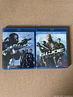 Front covers of two Blu-Ray cases of G.I. Joe movies showing characters and titles.