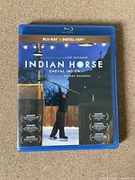 Front cover photo of Indian Horse Blu-Ray disc with blue plastic case.