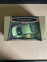 Top view of boxed Burago Volkswagen New Beetle 1998 model car