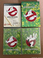 Front view of Ghostbusters and Ghostbusters 2 DVD cases along with double feature gift set cover.