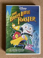 Front cover of The Brave Little Toaster DVD showing main characters and Disney branding.