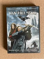 Front cover of the Van Helsing DVD showing the main characters and thematic imagery.