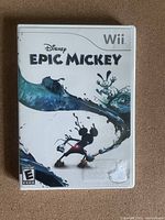 Front cover of Epic Mickey video game for Wii showing artwork and ESRB rating