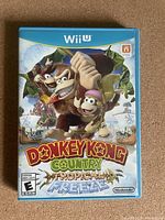 Front cover of Donkey Kong Country: Tropical Freeze game for Wii U showing the title and characters.